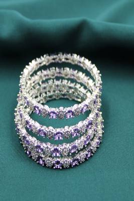 Rhodium plated zircon slide bangles  set of 4 1