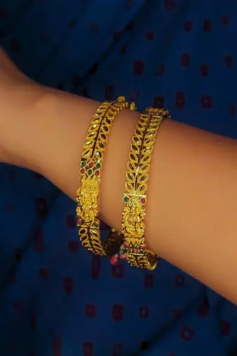 Gold plated temple slide bangles  set of 2