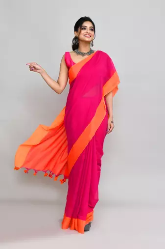 Orange border rani pink cotton saree with tassels