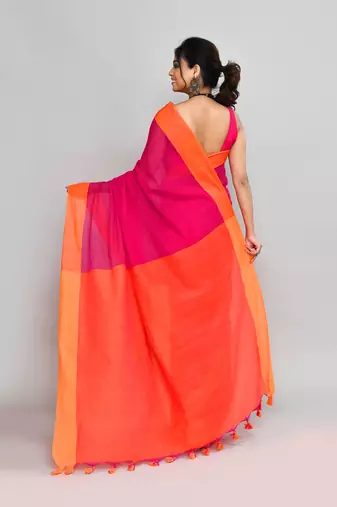 Orange border rani pink cotton saree with tassels