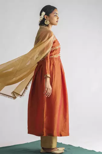 Rust orange floral embroidered georgette tissue kurta with pant and dupatta