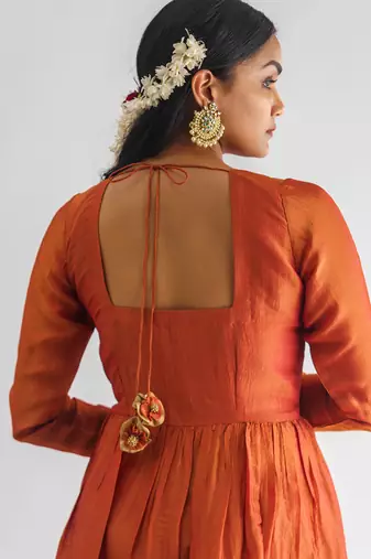 Rust orange floral embroidered georgette tissue kurta with pant