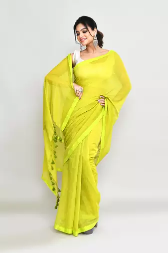 Woven's lime mulmul cotton saree with tassels without blouse