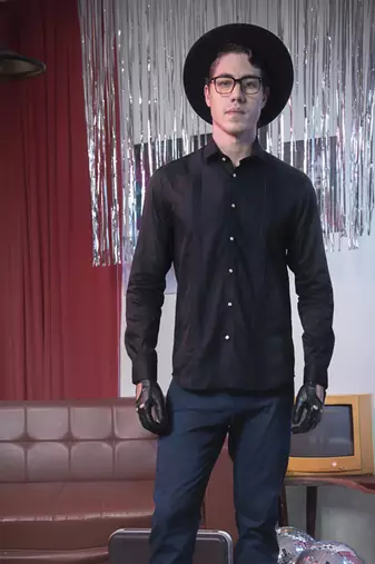 Black plain cotton men's shirt with fancy buttons and angled cuffs