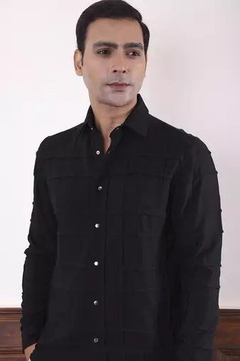 Black plain viscose men's shirt featuring intricate square tucks