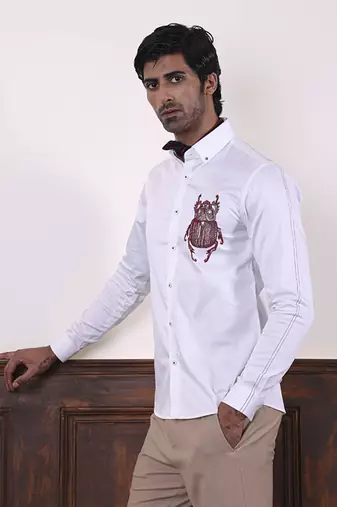 White plain cotton men's shirt with intricate artistry