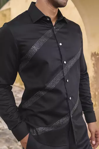 Black plain cotton men's shirt features stitch lines of silver zari
