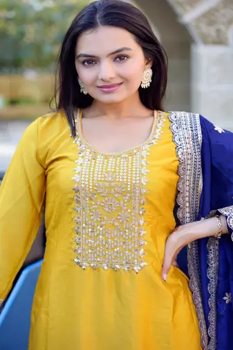 Yellow chinnon silk heavy emrboidery work fully salwar suit