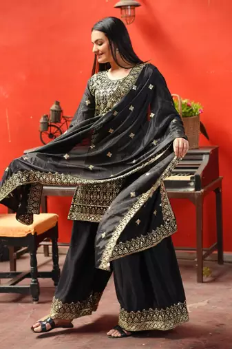 Black chinnon silk heavy emrboidery work fully sharara suit