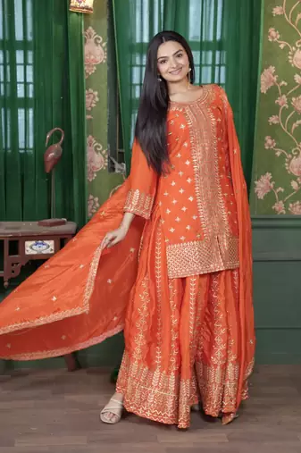 Orange chinnon silk heavy emrboidery work fully sharara suit
