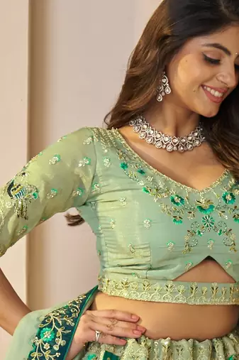 Green Patchwork and motif Banarasi silk Lehenga Lehenga with Unstiched Blouse