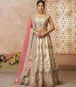 White Sequinse & Thread embroidered Zari silk Lehenga with unstiched Blouse