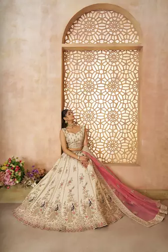 White Sequinse & Thread embroidered Zari silk Lehenga with unstiched Blouse