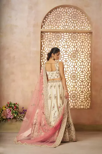 White Sequinse & Thread embroidered Zari silk Lehenga with unstiched Blouse