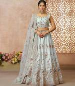 Sky Blue Sequinse & Thread embroidered Zari silk Lehenga with unstiched Blouse