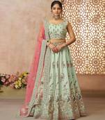Green Sequinse & Thread embroidered Zari silk Lehenga with unstiched Blouse