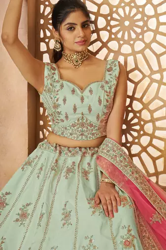 Green Sequinse & Thread embroidered Zari silk Lehenga with unstiched Blouse