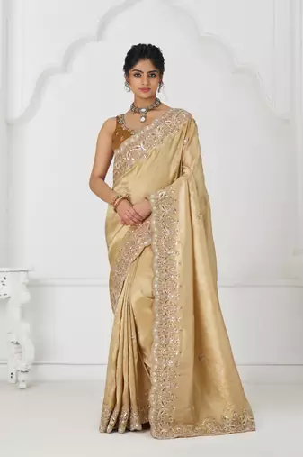 golden dola viscose silk blend saree with sequin and bead embroidery