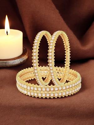  set of 4 gold plated pearl studded bangles 1
