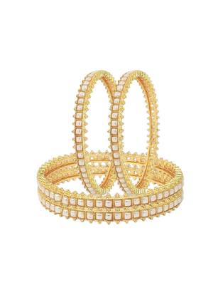  set of 4 gold plated pearl studded bangles 4