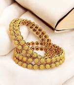  set of 4 gold plated ball design bangle set
