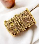 gold plated stone studded handcrafted chuda set