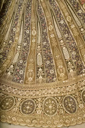 Mehendi Thread worked Net Lehenga with Unstiched Blouse