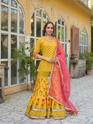 Divena yellow muslin kurti sharara with dupatta 1