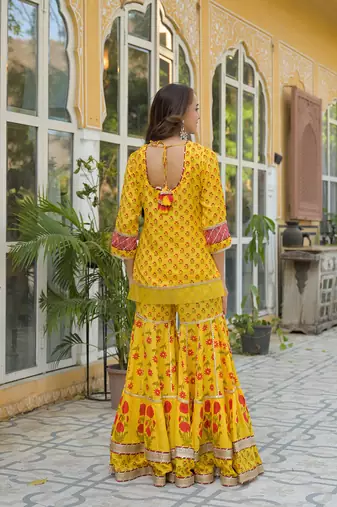 Divena yellow muslin kurti sharara with dupatta