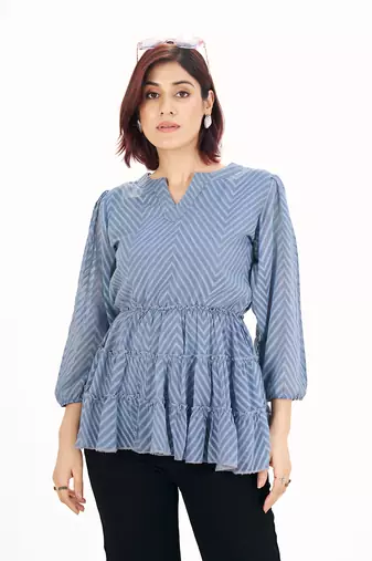 Blue self-textured puff sleeve empire top with layered detail