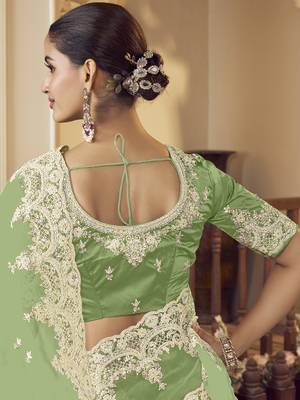 Green micro net party wear embroidered saree with blouse fabric  3