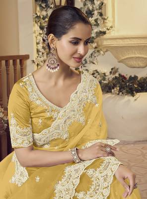 Yellow micro net party wear embroidered saree with blouse fabric  2