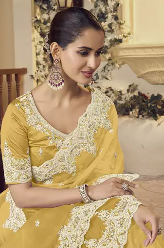Yellow micro net party wear embroidered saree with blouse fabric 