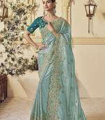 Light green georgette party wear embroidered saree with blouse fabric 
