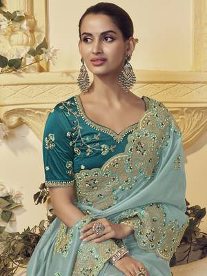 Light green georgette party wear embroidered saree with blouse fabric  3