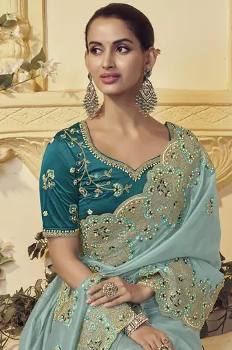 Light green georgette party wear embroidered saree with blouse fabric 