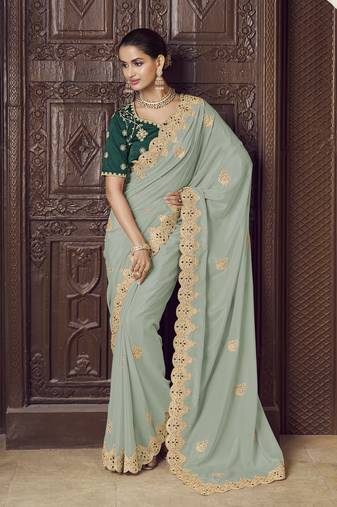 Green crepe party wear embroidered saree with blouse fabric 