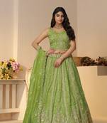 Green Zari, Stone and sequins work Jimmy choo Lehenga with unstiched Blouse