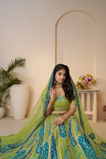 Green Embroidery with Sequin, stone work and sitara embellishments Silk Lehenga with unstiched Blouse