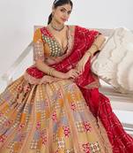 Mustard Position print Jaal Patterned party wear Silk lehengas with Sequin & Aari Work with Unstiched Blouse