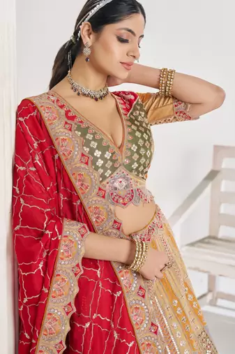 Mustard Position print Jaal Patterned party wear Silk lehengas with Sequin & Aari Work with Unstiched Blouse
