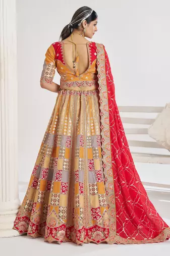 Mustard Position print Jaal Patterned party wear Silk lehengas with Sequin & Aari Work with Unstiched Blouse
