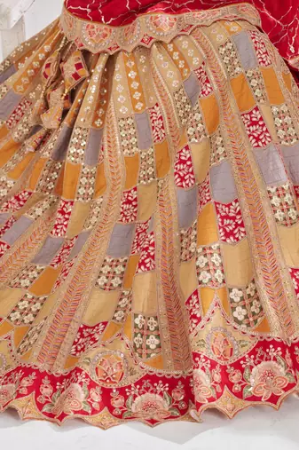 Mustard Position print Jaal Patterned party wear Silk lehengas with Sequin & Aari Work with Unstiched Blouse