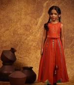 Orange cotton top and skirt set for girls.