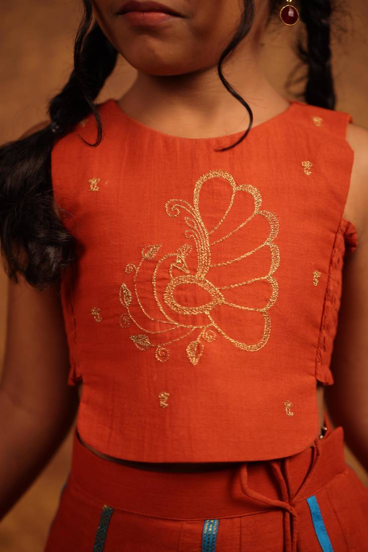 Orange cotton top and skirt set for girls.