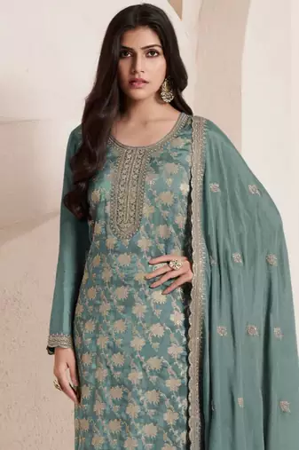 Green embroidered jacquard salwar suit