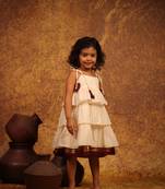 White cotton dress with maroon kanchipuram border at the hem