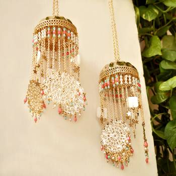 Golden disk with twinkling stars mini kaleere pink 3
