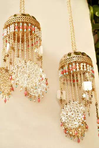 Golden disk with twinkling stars mini kaleere pink