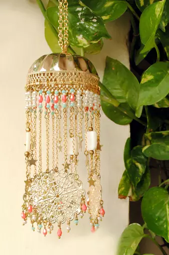 Golden disk with twinkling stars mini kaleere pink